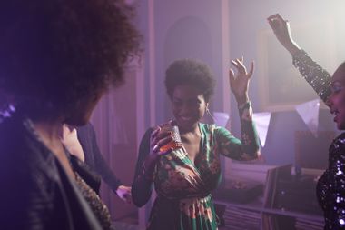 Young women having a party in an apartment